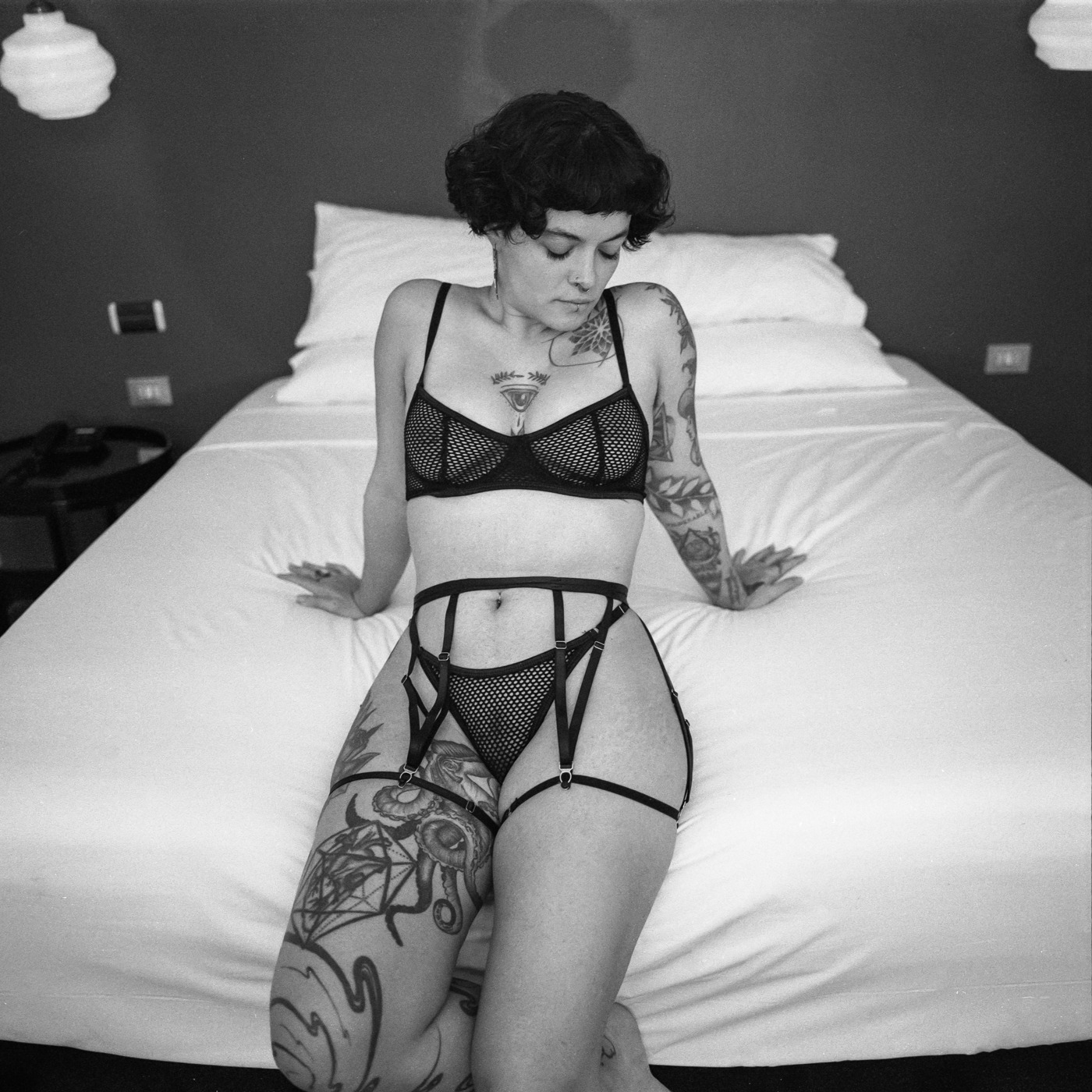 Erotic fil photoshoot in a hotel room